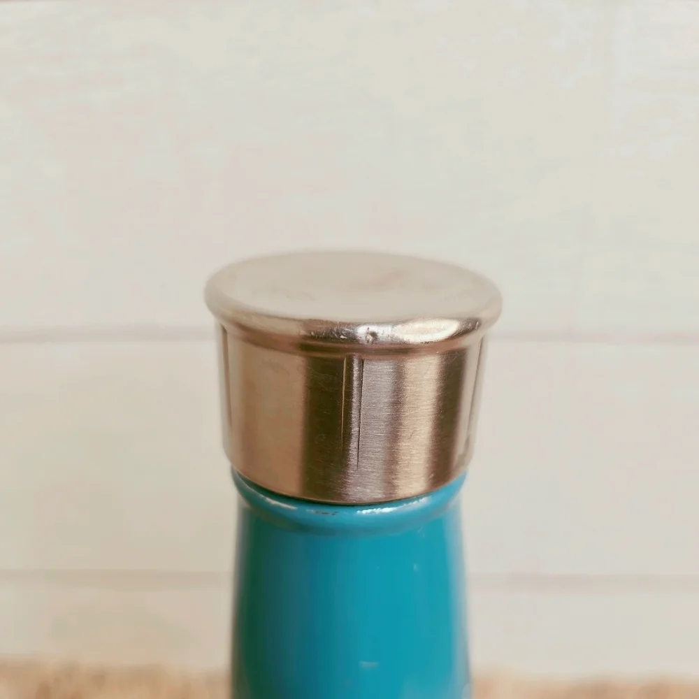 Swell Blue Bicycle Design Bottle with Silver Cap 2010